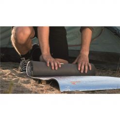 Man rolling up an Easy Camp Alloy EVA sleep mat